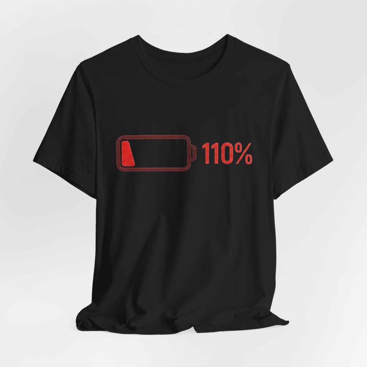Low Battery 110 Percent design on a Sort Of Ish unisex tee, black, hanging